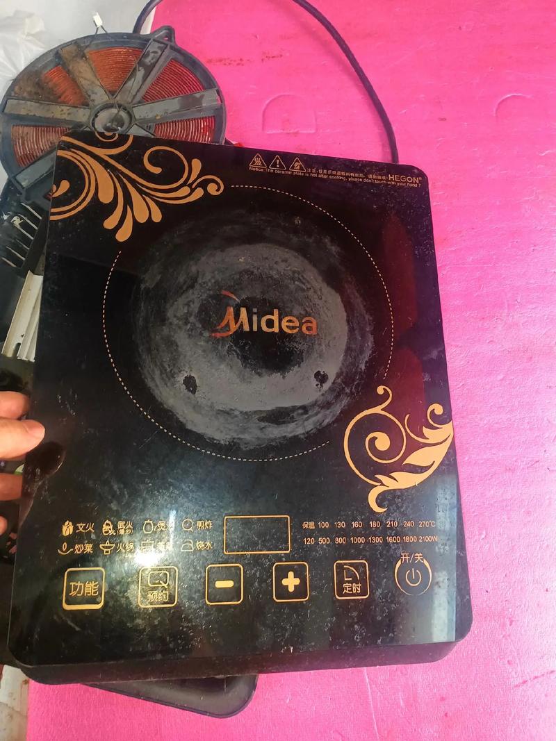 美的电磁炉sT2106显E6故障