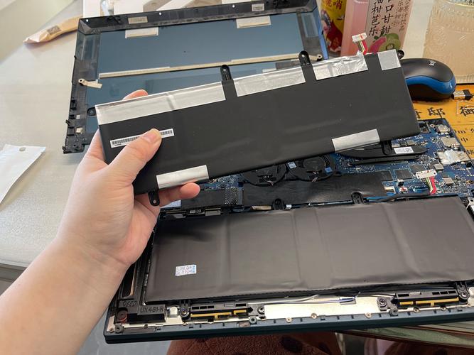 华硕笔记本电池怎么拆开